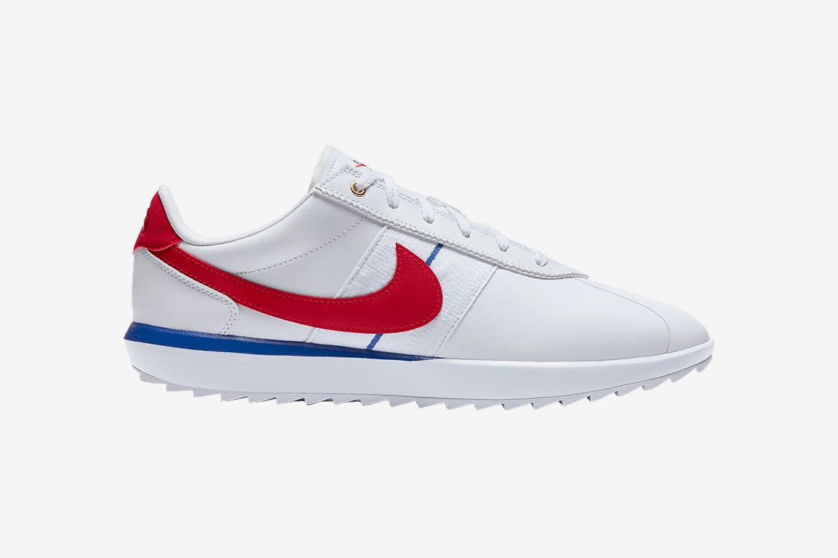 white and red nike golf shoes